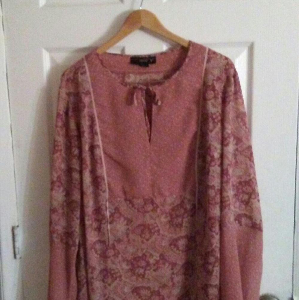 A beautiful loose-fitting sheer blouse